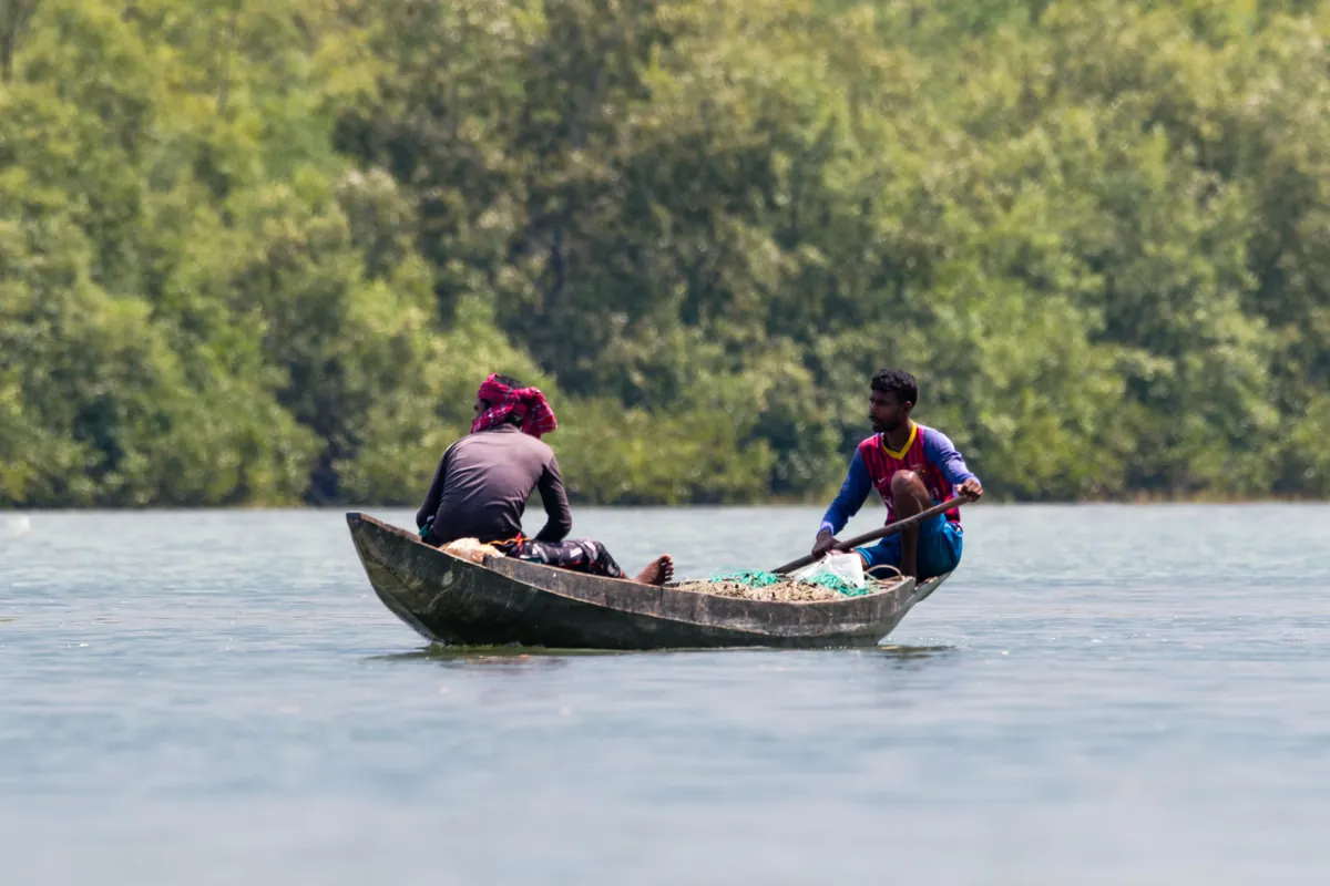Fishermen with boat