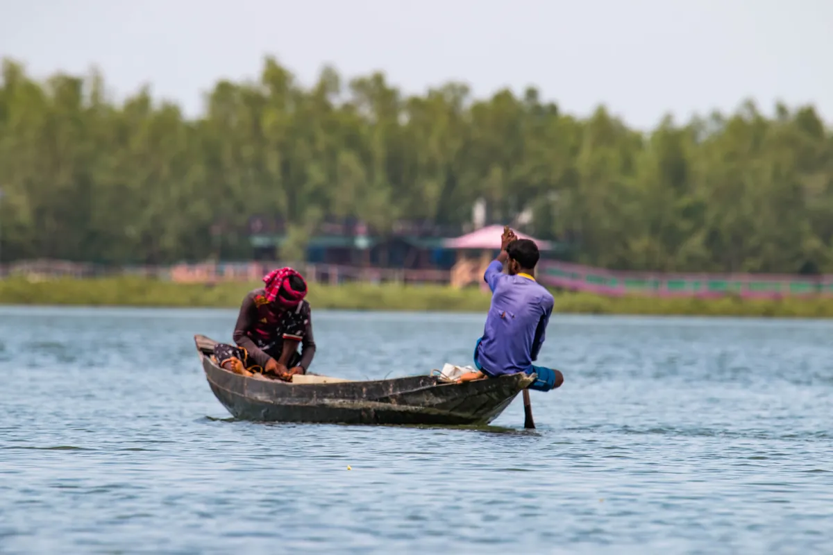 Fishermen with fishing boat